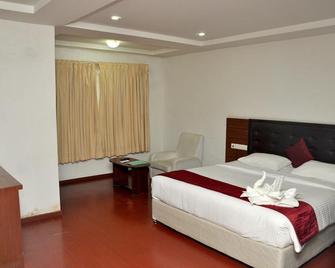 Vandayar Hotel - Chidambaram - Bedroom