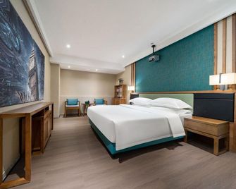 Huayi Jinxin Hotel - Čchao-čou - Ložnice