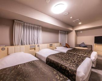 Apa Hotel Shin Osaka Eki Tower - Osaka - Bedroom