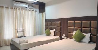 Hotel Indira - Jorhāt - Bedroom