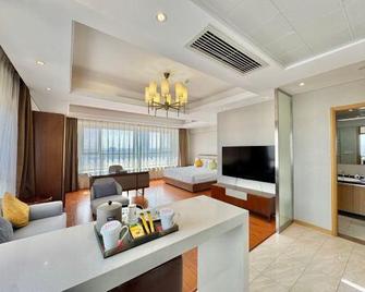 Yantai Tianma Argyle Hotel Apartment - Yantai - Wohnzimmer