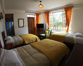 Amaru Valle Hotel - Urubamba - Slaapkamer