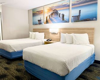 Days Inn by Wyndham Greenville - Ґрінвілл - Спальня