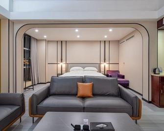 Melodious & Cozy Hotel - Xianning - Slaapkamer