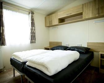 Well-furnished chalet near the Loonse - Udenhout - Bedroom