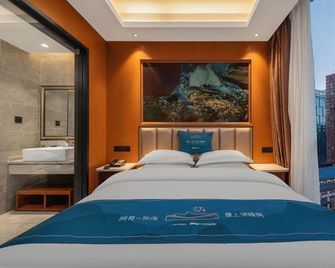 Wanyi International Hotel - גויאנג - חדר שינה