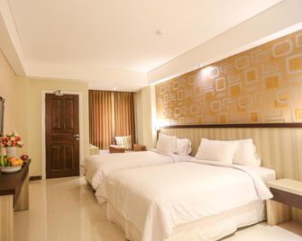 Sylvia Hotel Premier Kupang - Kupang - Schlafzimmer