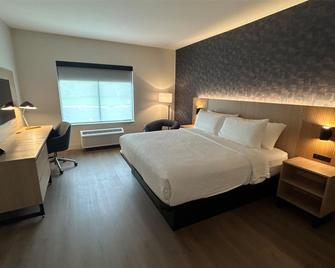 Best Western Byron Center - Byron Center - Schlafzimmer