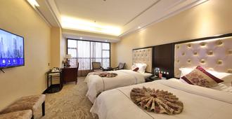 Tongda International Hotel - Zhangjiajie - Bedroom