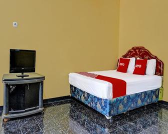 Spot On 91798 Hotel Grand Mutiara - Karawang - Спальня