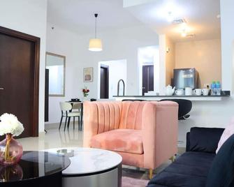 Breathtaking High Rise Escape 1BR at Al Reem - Abu Dhabi - Living room