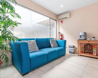 Hotel Ayenda Suites Orrantia - Lima - Living room