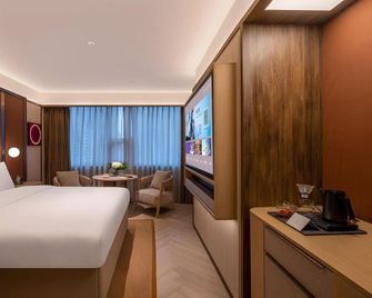 Oriental Mango Crystal Hotel (High-speed Railway Station) - Dongfang - Bedroom
