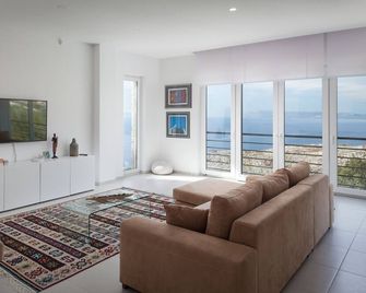 Stunning SEA VIEW: Modern luxury villa;250m2 terraces;big pool &garden,BBQ,sauna - Podgora - Living room