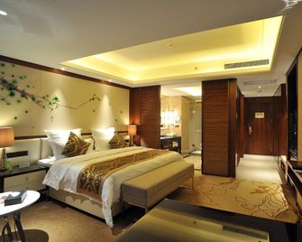 Guolong Hotel - Wuzhou - Bedroom