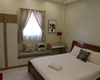 Long Hostel - Ho Chi Minh - Camera da letto