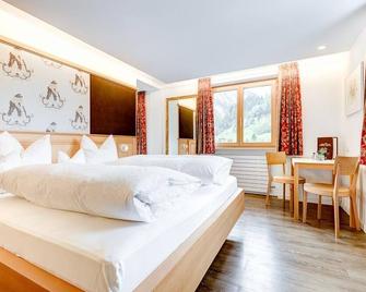Hotel Gasthof Kreuz - Sonntag - Bedroom