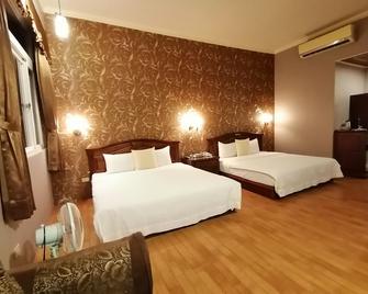 Di Bao Motel - Ji'an Township - Schlafzimmer