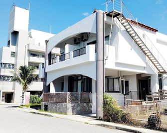 Kariyushi Condominium Resort Nago Sea Side House - Nago - Byggnad