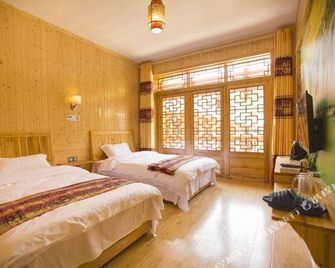 Qingyan Xianju Inn - Zhangjiajie - Sypialnia
