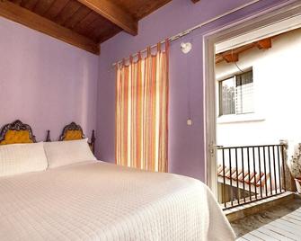 Quetzalroo Boutique Hostel - Guatemala City - Bedroom