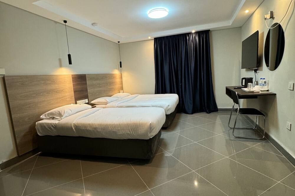 Ivory Park Hotel - Nakuru - Schlafzimmer