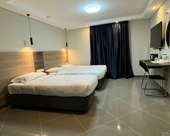Ivory Park Hotel - Safari Waterworld - Nakuru - Slaapkamer