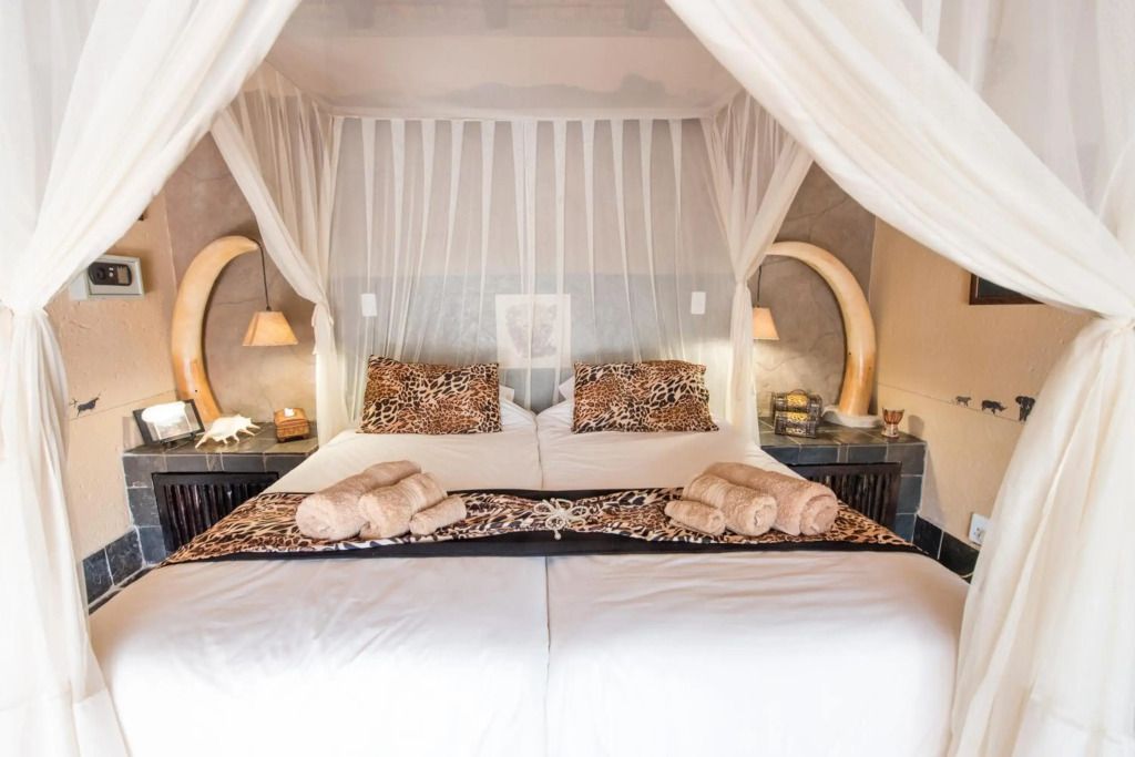 African Rock Lodge - הודספרוט - חדר שינה