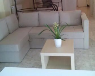 Rafina suits - Rafina - Living room