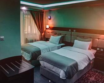 هوتل يونيفرس 3 - نيامي - غرفة نوم