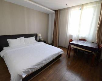 Jiangshan 128 Hotel - Zhenjiang - Bedroom