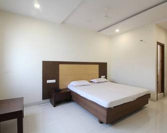 Hotel Swapna - Vijayawada - Slaapkamer