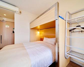 Super Hotel Ogaki Ekimae - Ogaki - Спальня