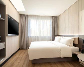 Hanting Hotel Beijing Shijingshan Wanda Lugu Street - Beijing - Bedroom