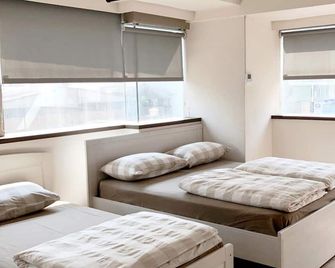 Ahiruyah Guest House in Kaohsiung - Hostel - קאושיונג - חדר שינה