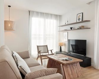 Port Forum Apartments by Olala Homes - Барселона - Вітальня