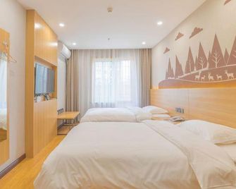 Xinyue Business Hotel - Yan’an - Habitación