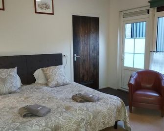 lodge 61 hotel aan het water - 메뎀블리크 - 침실