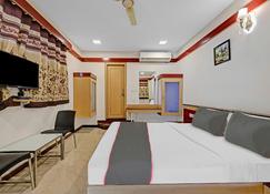 Collection O Sri Sai Ram Suites - Bengaluru - Bedroom
