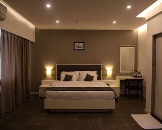 Hotel Dwarawata - Dharwad - Habitación