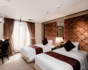 Amaroossa Hotel Bandung - Bandung - Schlafzimmer