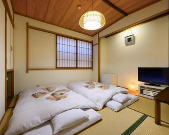 Hotel Sakuranbo - Yamagata - Ložnice