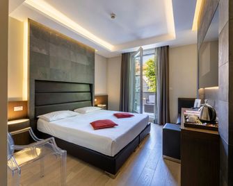 Una Hotels Villa Dei Platani Foligno - Foligno - Спальня