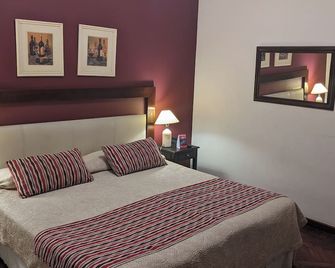 Delvino Boutique Hotel - Salta - Sypialnia