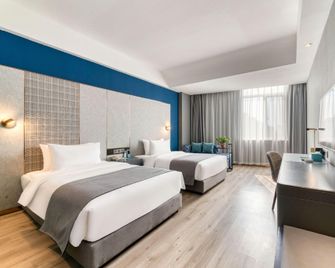 Lano Hotel Shandong Heze Mudan District Caozhou Mudanyuan - Heze - Спальня