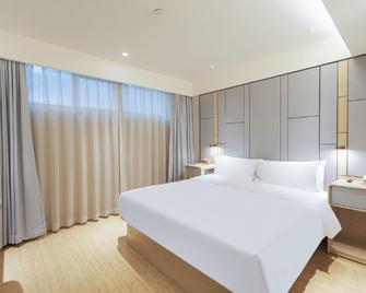 Ji Hotel Tianjin Binjiangdao - Tianjin - Bedroom