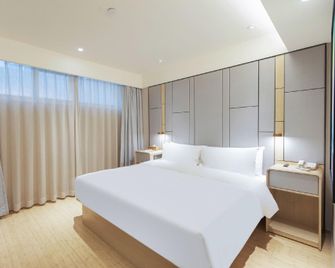Ji Hotel Tianjin Binjiang Road Jili Building - تيانجين - غرفة نوم