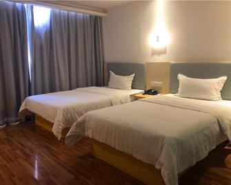 7Days Inn Changsha Hu'nan Guangdian Changsha University Branch - Changsha - Camera da letto
