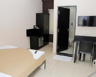 Hotel Sri Krishna Residency - Udupi - Bedroom