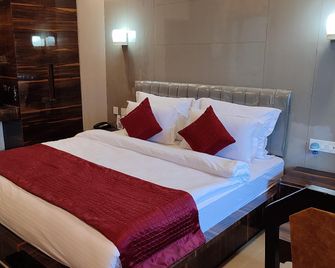 Hotel Jmd International Purnea - Purnea - Bedroom